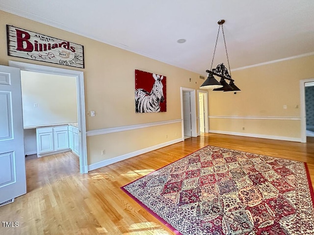 141 Country Club Dr, Henderson, NC 27536 - dining space with wood finished floors and crown molding