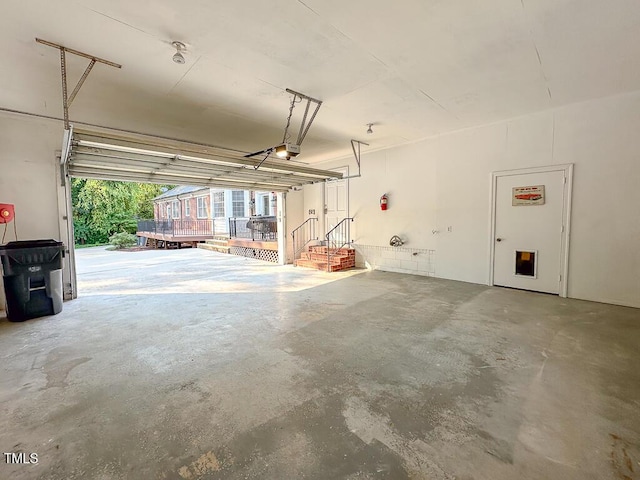 141 Country Club Dr, Henderson, NC 27536 - garage featuring a garage door opener