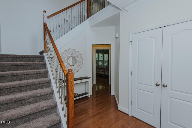 301 Grove Hall Ln, Mebane, NC 27302 - stairs featuring wood finished floors and baseboards