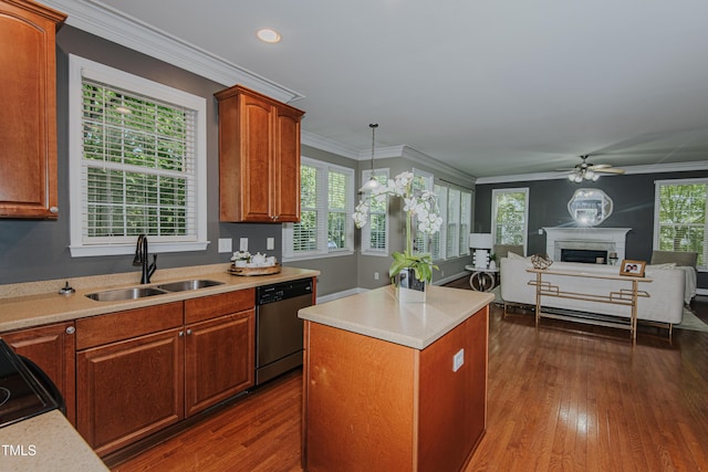 301 Grove Hall Ln, Mebane, NC 27302 - kitchen featuring dishwasher, open floor plan, light countertops, a fireplace, and dark wood-type flooring