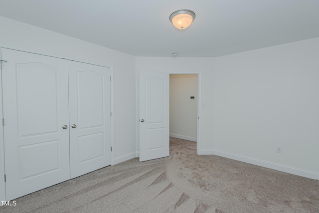 301 Grove Hall Ln, Mebane, NC 27302 - unfurnished bedroom featuring carpet and a closet