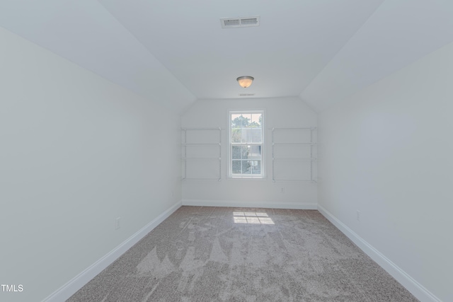 301 Grove Hall Ln, Mebane, NC 27302 - additional living space featuring vaulted ceiling and carpet floors