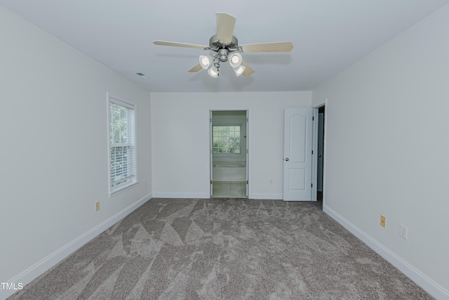 301 Grove Hall Ln, Mebane, NC 27302 - spare room featuring carpet and ceiling fan