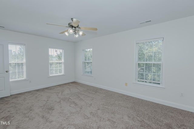 301 Grove Hall Ln, Mebane, NC 27302 - carpeted empty room featuring baseboards and a ceiling fan