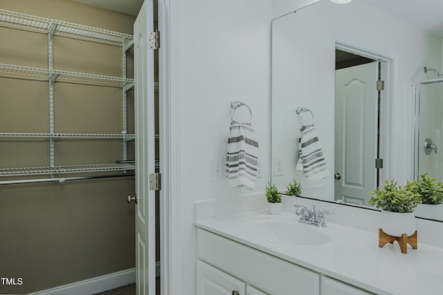 301 Grove Hall Ln, Mebane, NC 27302 - bathroom with vanity and baseboards