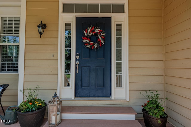 301 Grove Hall Ln, Mebane, NC 27302 - doorway to property with a porch