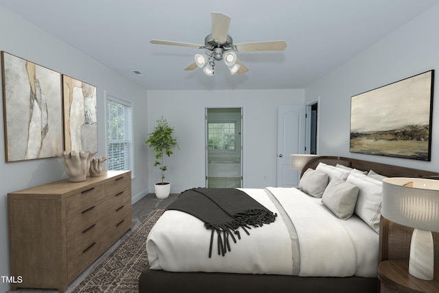 301 Grove Hall Ln, Mebane, NC 27302 - bedroom with ensuite bath, a ceiling fan, and dark carpet