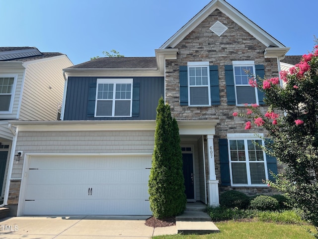 607 Finnbar Dr, Cary, NC 27519 - craftsman-style house featuring stone siding, concrete driveway, and an attached garage