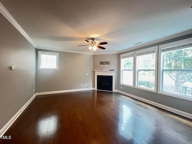 607 Finnbar Dr, Cary, NC 27519 - unfurnished living room with ceiling fan, ornamental molding, dark wood-type flooring, and a fireplace