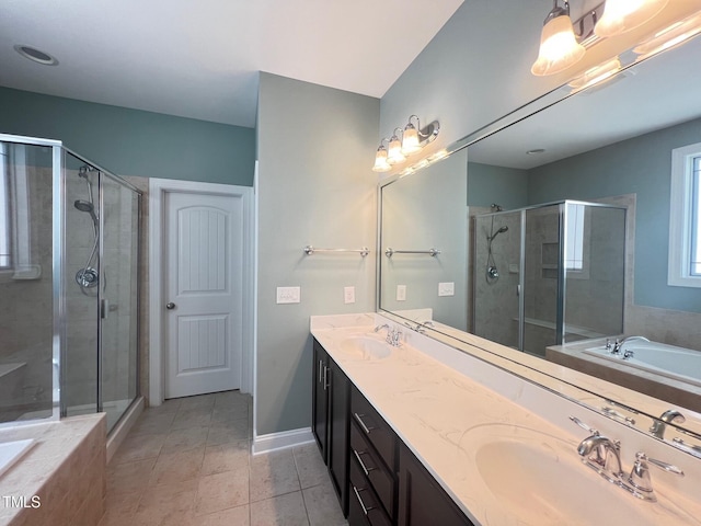 607 Finnbar Dr, Cary, NC 27519 - full bath with a bath, a stall shower, double vanity, and tile patterned floors