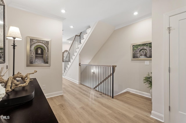 930 Watercolor Way, Durham, NC 27713 - corridor featuring light wood finished floors, recessed lighting, and an upstairs landing