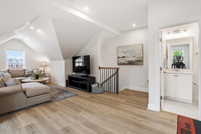 930 Watercolor Way, Durham, NC 27713 - living area featuring light wood-style floors, plenty of natural light, recessed lighting, and vaulted ceiling