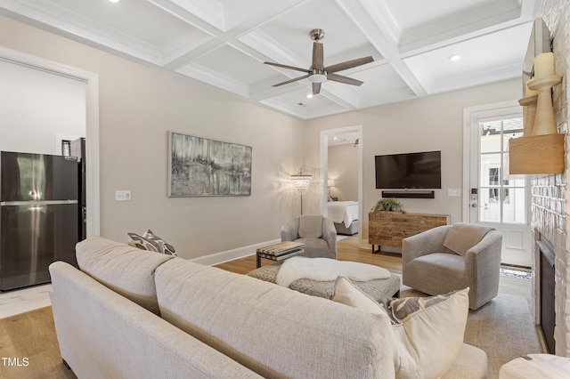 930 Watercolor Way, Durham, NC 27713 - living room featuring a ceiling fan, coffered ceiling, beam ceiling, light wood-style floors, and recessed lighting