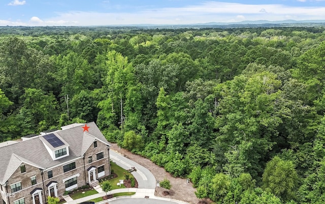 930 Watercolor Way, Durham, NC 27713 - aerial view of property and surrounding area featuring a heavily wooded area