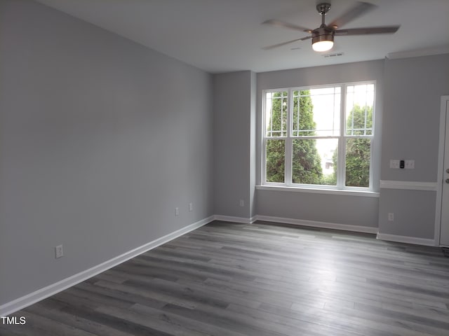 408 Timpson Ave, Durham, NC 27703 - unfurnished room with a ceiling fan and dark wood-style flooring
