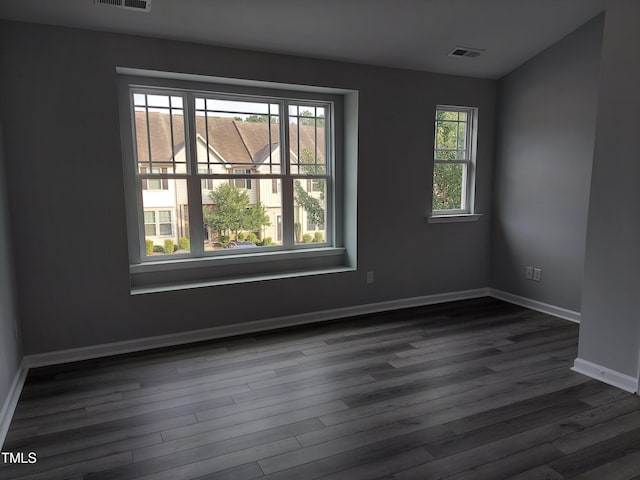 408 Timpson Ave, Durham, NC 27703 - empty room with dark wood-style flooring and baseboards