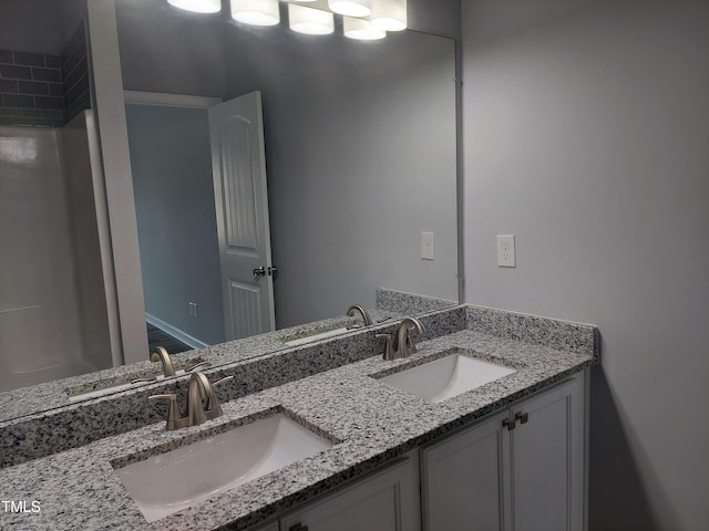 408 Timpson Ave, Durham, NC 27703 - full bathroom featuring double vanity