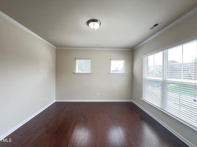 1521 Kythira Dr, Apex, NC 27502 - spare room with dark wood-type flooring and ornamental molding