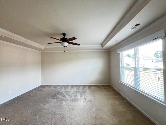 1521 Kythira Dr, Apex, NC 27502 - carpeted empty room with a raised ceiling, ceiling fan, and ornamental molding