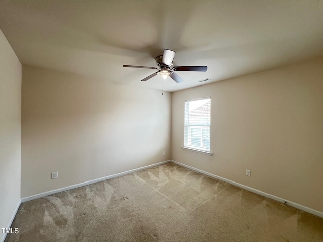 1521 Kythira Dr, Apex, NC 27502 - carpeted spare room featuring a ceiling fan and baseboards