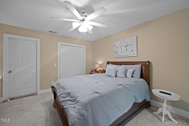 2424 Village Of Wakefield Dr, Zebulon, NC 27597 - bedroom with carpet flooring, a closet, and ceiling fan