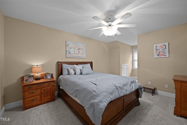 2424 Village Of Wakefield Dr, Zebulon, NC 27597 - bedroom with light carpet and a ceiling fan