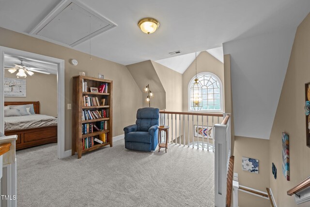 2424 Village Of Wakefield Dr, Zebulon, NC 27597 - living area with attic access, carpet, a ceiling fan, and an upstairs landing