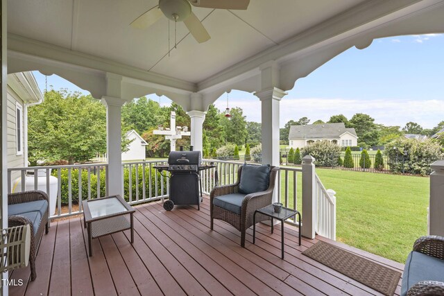 2424 Village Of Wakefield Dr, Zebulon, NC 27597 - deck with area for grilling, ceiling fan, and a yard