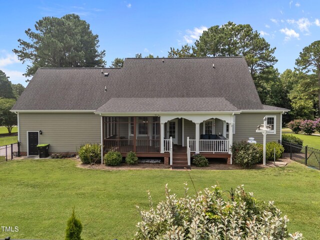 2424 Village Of Wakefield Dr, Zebulon, NC 27597 - back of property with a fenced backyard and a shingled roof