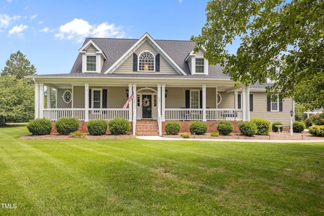 2424 Village Of Wakefield Dr, Zebulon, NC 27597 - view of front of home with a shingled roof, a front lawn, and covered porch