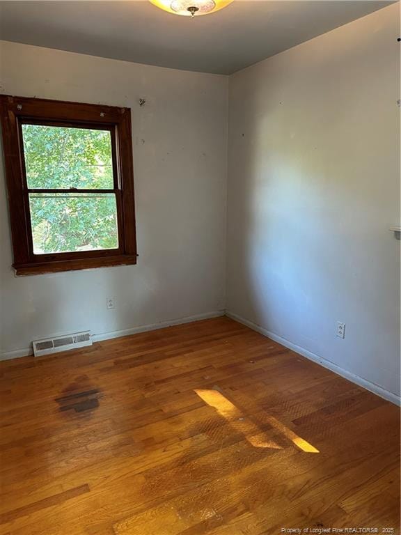 1404 Faye Ave, Spring Lake, NC 28390 - empty room featuring wood finished floors and baseboards