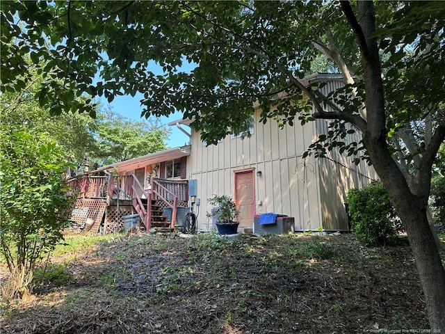 1404 Faye Ave, Spring Lake, NC 28390 - back of property featuring a deck and stairway