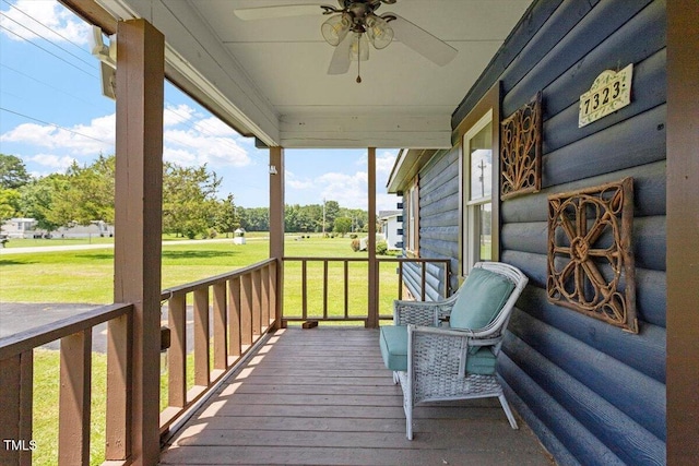 7323 Powell Hooks Rd, Lucama, NC 27851 - porch with a ceiling fan and a yard