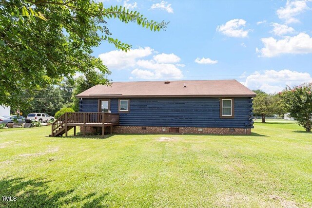 7323 Powell Hooks Rd, Lucama, NC 27851 - rear view of property with crawl space, a wooden deck, a yard, log exterior, and stairs