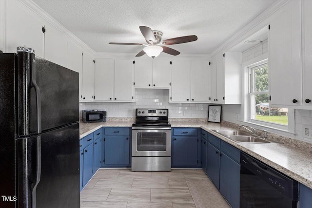 7323 Powell Hooks Rd, Lucama, NC 27851 - kitchen with black appliances, blue cabinets, ceiling fan, decorative backsplash, and a textured ceiling