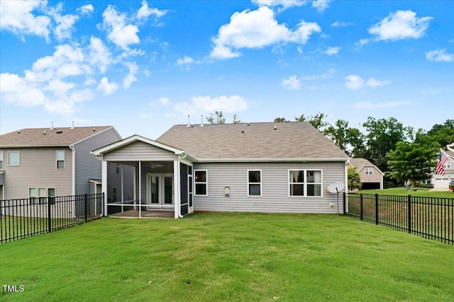 56 E Copenhaver Dr, Clayton, NC 27527 - back of house with a sunroom, a fenced backyard, and roof with shingles