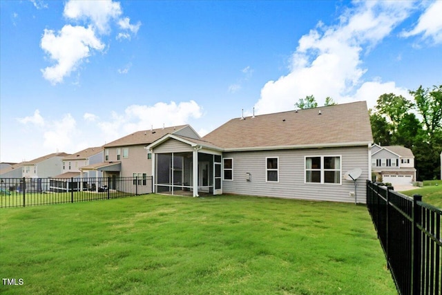 56 E Copenhaver Dr, Clayton, NC 27527 - rear view of house with a sunroom and a fenced backyard