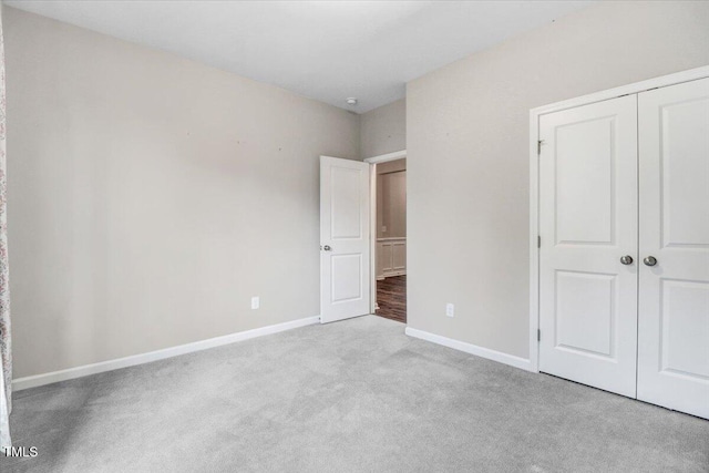 56 E Copenhaver Dr, Clayton, NC 27527 - unfurnished bedroom featuring carpet flooring and a closet