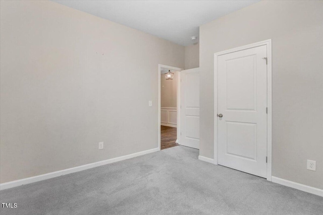 56 E Copenhaver Dr, Clayton, NC 27527 - unfurnished bedroom with carpet floors and baseboards