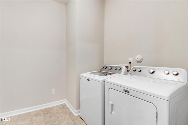 56 E Copenhaver Dr, Clayton, NC 27527 - laundry room with separate washer and dryer and baseboards