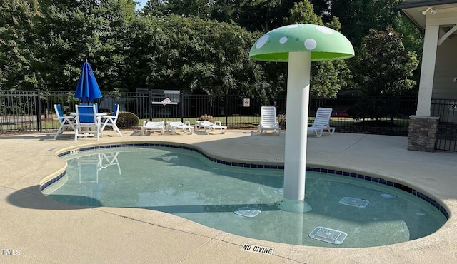 56 E Copenhaver Dr, Clayton, NC 27527 - community pool with a patio and view of scattered trees