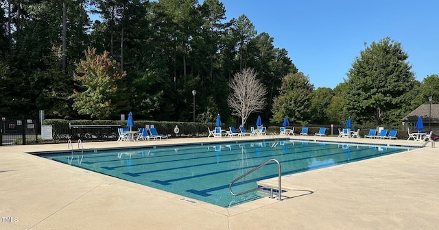 56 E Copenhaver Dr, Clayton, NC 27527 - community pool featuring a patio