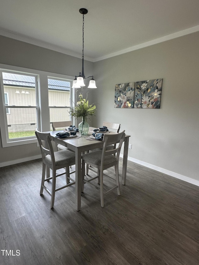 1849 N Main St, Roxboro, NC 27573 - dining area with dark wood-style flooring and crown molding