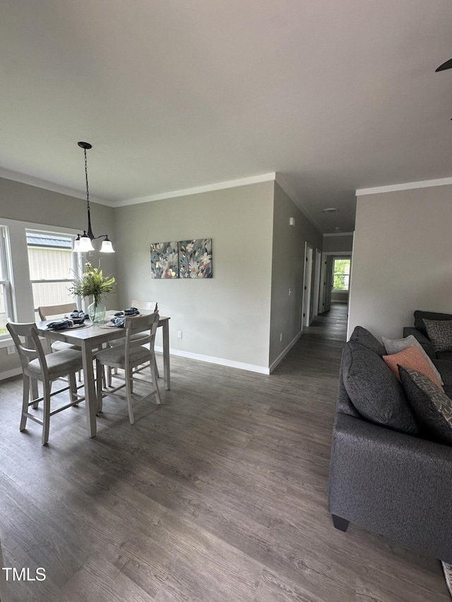 1849 N Main St, Roxboro, NC 27573 - dining area featuring crown molding and dark wood finished floors