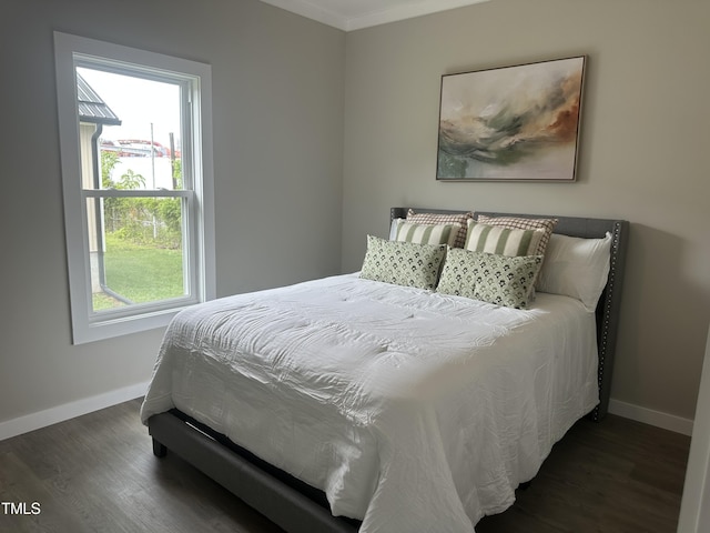 1849 N Main St, Roxboro, NC 27573 - bedroom with wood finished floors and ornamental molding