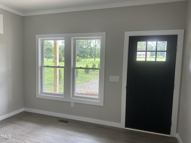 1849 N Main St, Roxboro, NC 27573 - foyer with ornamental molding and wood finished floors