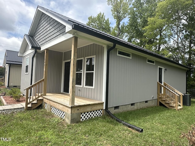 1849 N Main St, Roxboro, NC 27573 - view of property exterior with crawl space, a yard, and entry steps