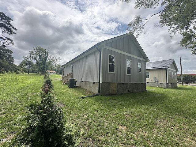 1849 N Main St, Roxboro, NC 27573 - view of property exterior with crawl space and a yard