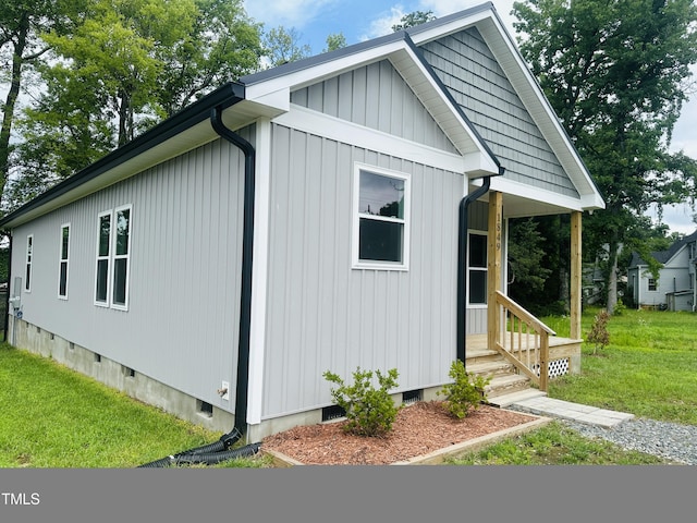 1849 N Main St, Roxboro, NC 27573 - view of property exterior featuring crawl space and a lawn