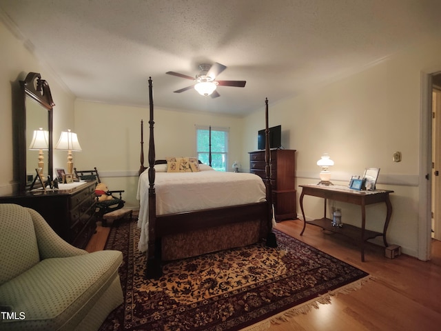 6517 Whitted Rd, Fuquay Varina, NC 27526 - bedroom featuring wood finished floors, crown molding, and a ceiling fan